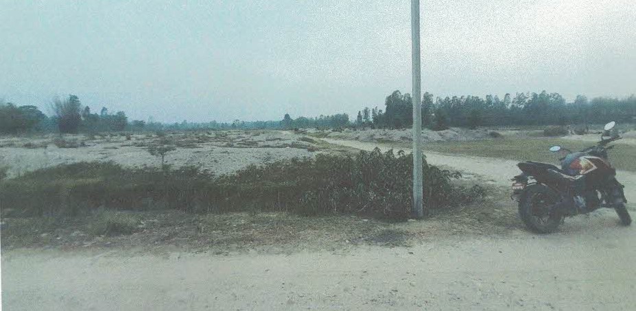 सिराहा जिल्ला नैनपुर गा.वि.स. वडा नं. ९, (हाल धनगढीमाई नगरपालिका वडा नं. ११) नक्सा सीट नं. ९ख स्थित कित्ता नं. १ को जग्गा क्षेत्रफल २–८–१४–० (विघा–कठ्ठा–धुर–कन्वा) (१६,४९१.७४ व. मी.) जग्गा 8